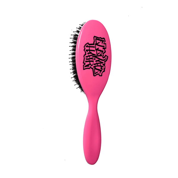 Pink ELEVATE HAIR cushion brush with black nylon and boar bristles to smooth hair and retain shine.