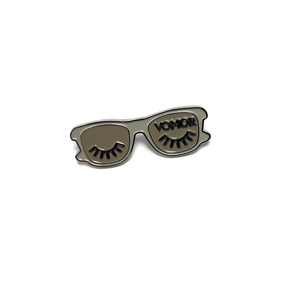 VoMor Lash Sunnies enamel lapel pin with sunglasses design featuring eyelashes, perfect accessory for lash lovers.