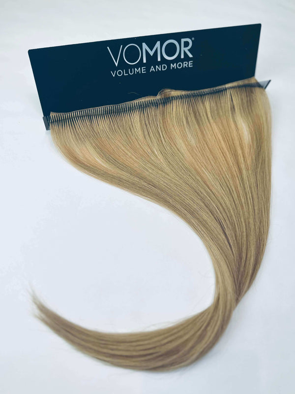 VoMor hair extensions holder displaying blonde hair extension for organized styling and application.