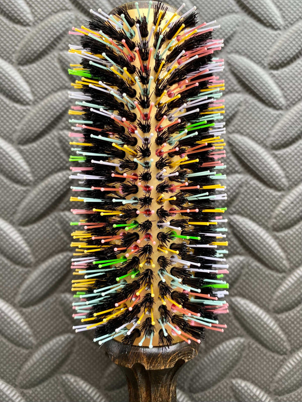 ElevateHair Rainbow Thermal Brush with colorful nylon and boar bristles on a beechwood handle for optimal heat styling and shine.