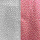 Blush and silver Colortrak foil sheets with textured surface for hair coloring