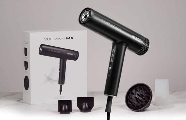 VULCANN MX Professional BLDC 1875W Dryer with accessories and packaging box displayed on a marble surface.